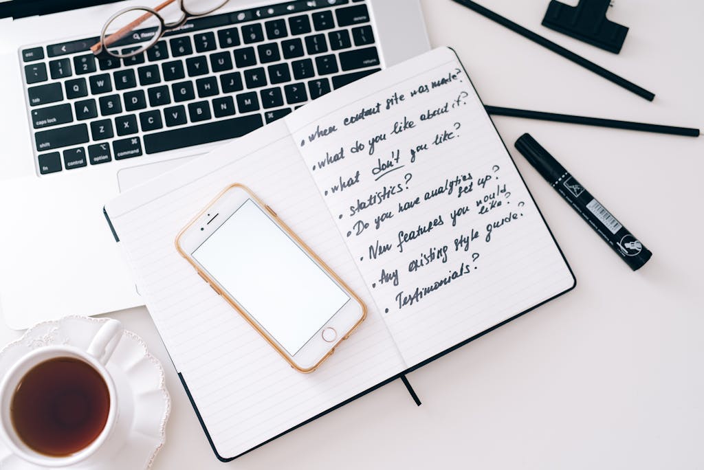 Smartphone on Top of a Notebook